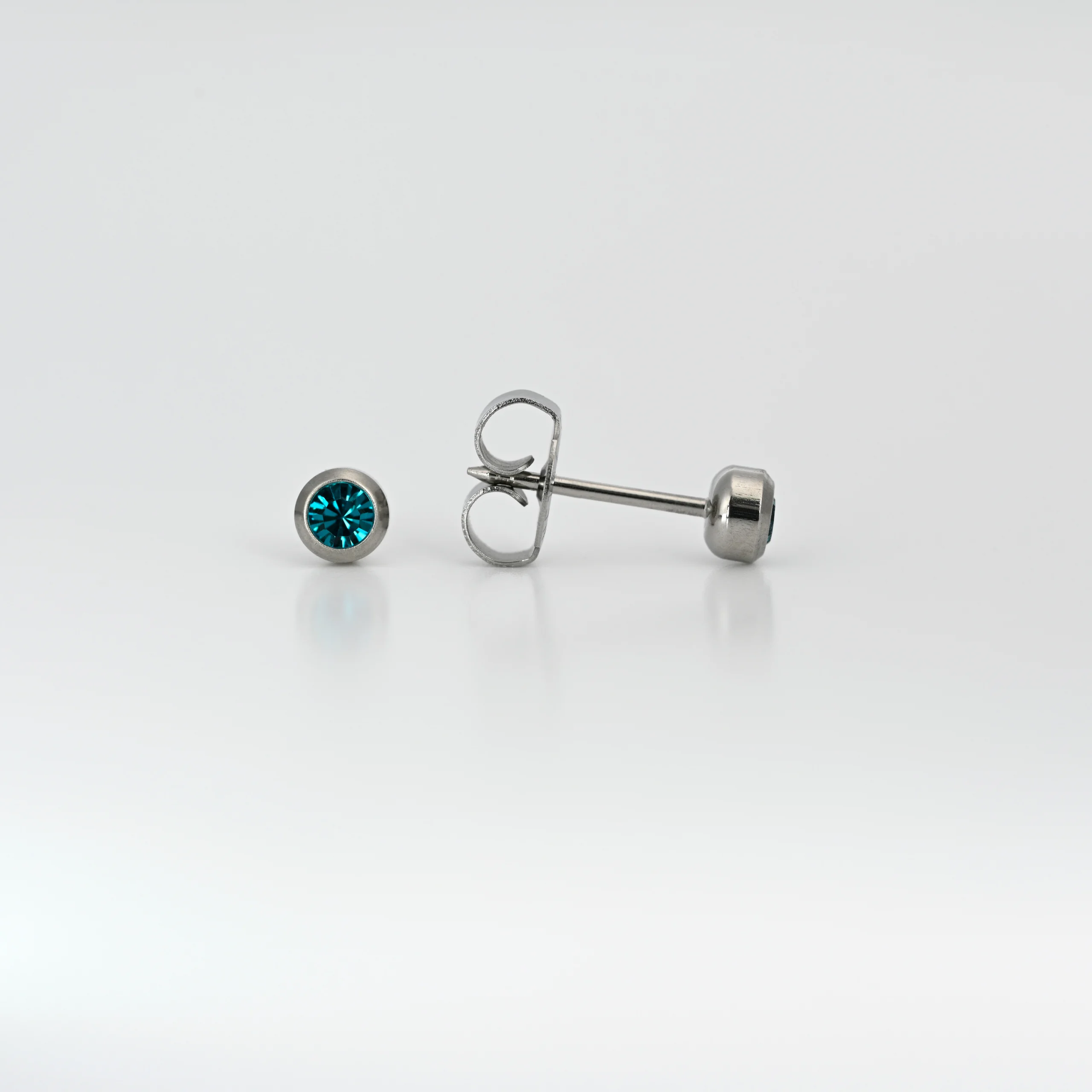7512 0212 3000 H scaled - SYS75 S/STEEL 4mm BEZEL BLUE ZIRCON